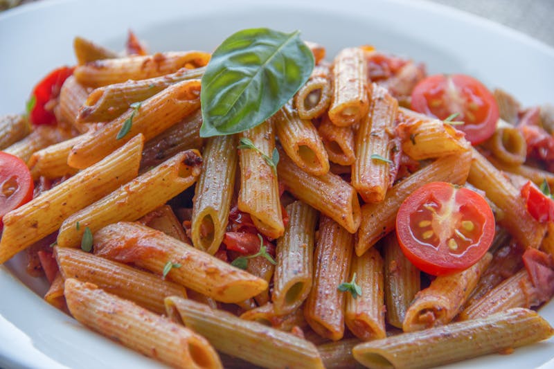 Pasta bowl with fresh herbs and sauce